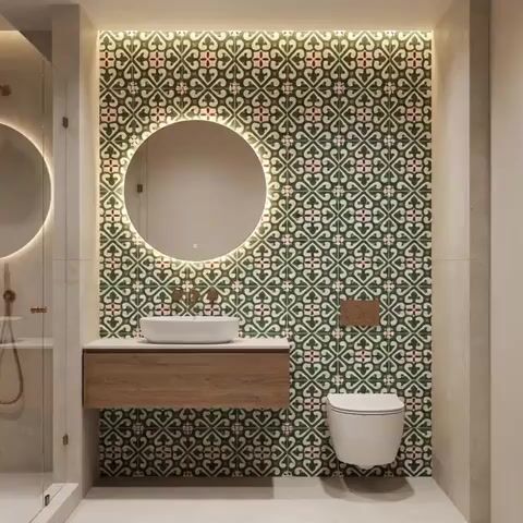 Modern bathroom walkthrough with green moroccan patterned wall tiles and floating wood vanity