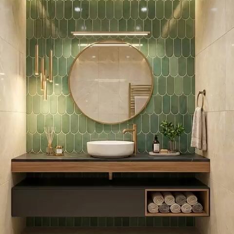 Modern bathroom walkthrough with green scallop wall tiles and black stone countertop vanity
