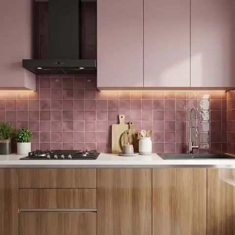 Modern kitchen walkthrough with pastel pink laminate, wood grain laminate, and mauve square backsplash tiles