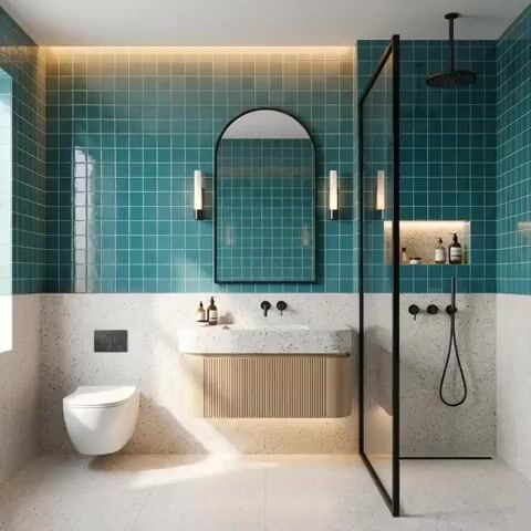 Modern bathroom walkthrough with turquoise blue wall tiles, terrazzo wall and floor tiles, and fluted wood vanity