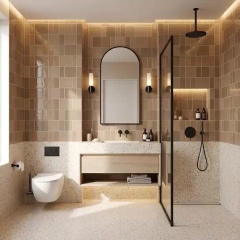 Modern bathroom walkthrough with beige glossy subway wall tiles and terrazzo floor and wall tiles