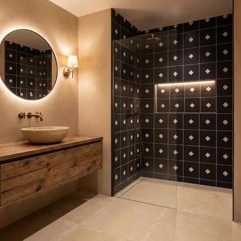 Modern bathroom walkthrough with black geometric wall tiles, beige stone floor tiles, and rustic wood vanity