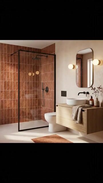 Minimalist bathroom walkthrough with terracotta vertical subway wall tiles and light oak floating vanity