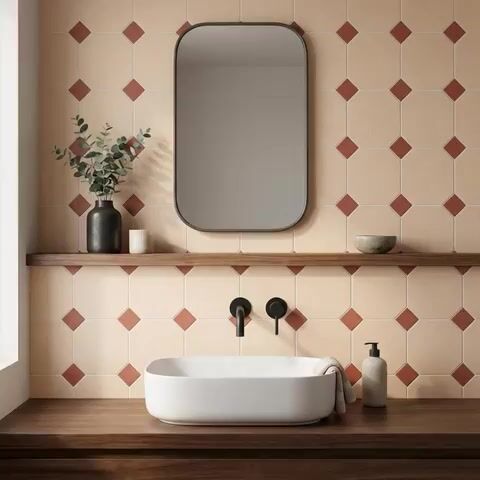 Minimalist bathroom walkthrough with beige and terracotta geometric wall tiles and walnut wood countertop