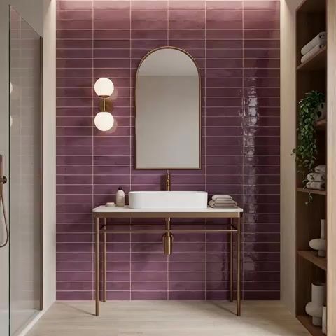 Modern bathroom walkthrough with plum subway wall tiles and light wood floor tiles