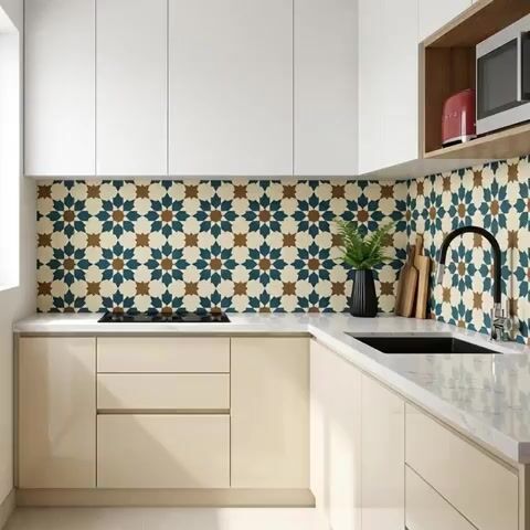 Modern kitchen walkthrough with beige laminate cabinets, white marble countertop, and geometric moroccan backsplash tiles