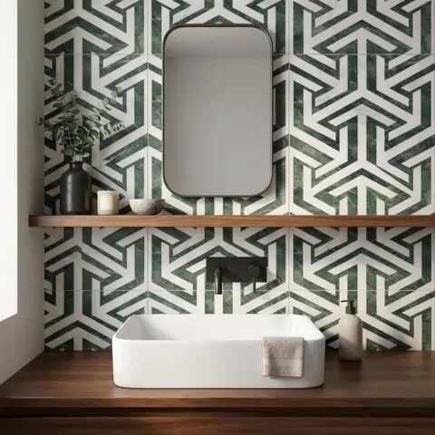 Modern bathroom walkthrough with green geometric wall tiles and walnut wood countertop