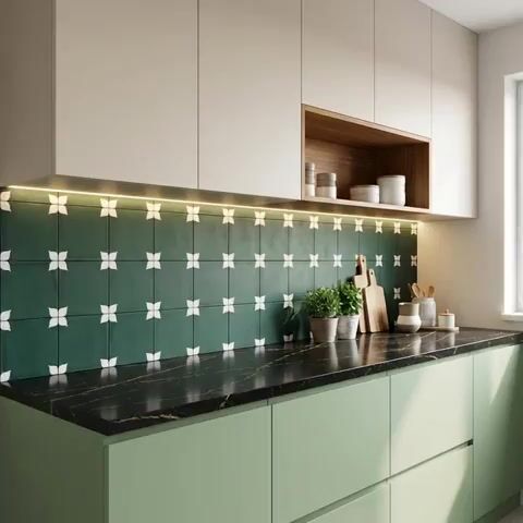 Modern kitchen walkthrough with sage green laminate, black marble countertop, and green geometric backsplash tile