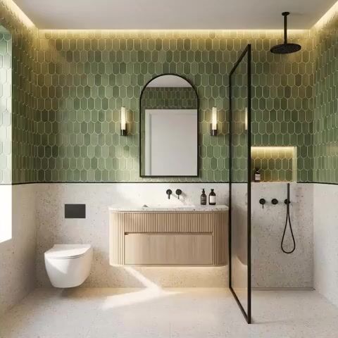 Modern bathroom walkthrough with green fish scale wall tiles and terrazzo floor and wall tiles