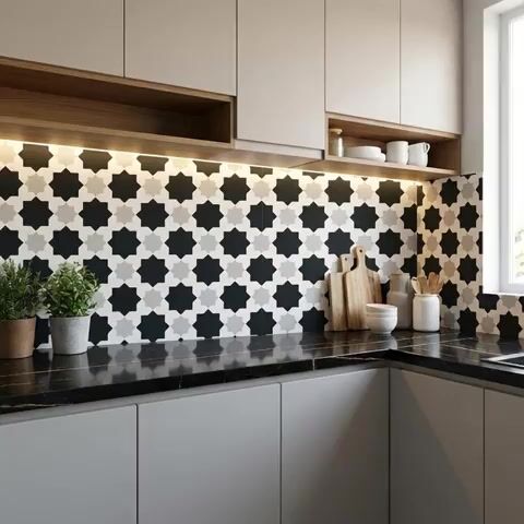 Modern kitchen walkthrough with black-and-white geometric moroccan backsplash tile and matte black marble countertop