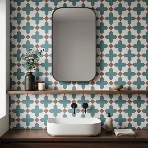 Modern bathroom walkthrough with teal geometric patterned wall tiles and walnut wood vanity